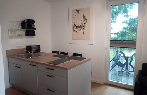 Neeberg House | Vacation apartment 2 - Achterwasser: Comfort with balcony, terrace & water view