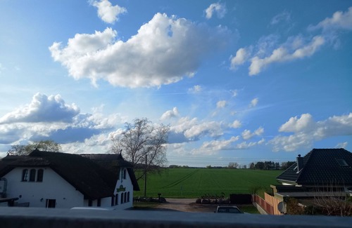 Neeberg House | Vacation apartment 2 - Achterwasser: Comfort with balcony, terrace & water view