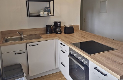 Neeberg House | Vacation apartment 4 - Schwalbennest: comfort, dog welfare with a view of the Achterwasser