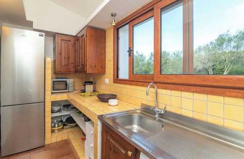 Baja Sardinia House | Vacation Home “Felix” close to the Beach with Sea View, Wi-Fi, Terrace & Garden