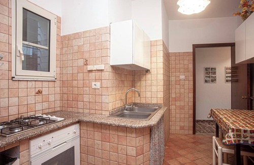 Porto Pino Villa | Vacation Home 'Fronte Mare Al Porticciolo' with Sea View, Barbecue Area & Wi-Fi
