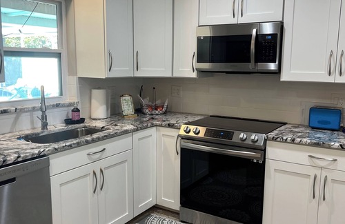 Seminole House | Vacation unheated spillover pool home close to beach