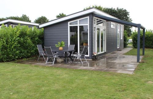 Lathum Ski Chalet | Vakantiehuis met vijverzicht