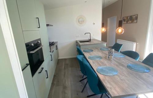 Scherpenisse Ski Chalet | Vakantiepark de Zeeuwse Parel - de Schelde