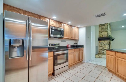 Palm Harbor House | Valencia Manor, your family home away from home with pool and spa heat avalaible