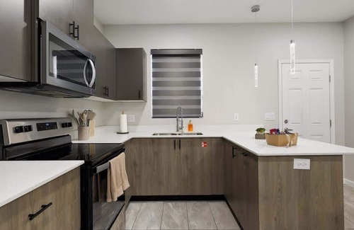 Pharr Apartment | Velvet Grove: Relax & Recharge in Style