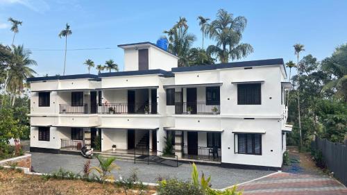 Sulthan Bathery Apartment | VENUE DAYS homestays
