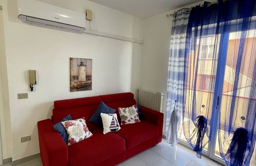 La Maddalena Apartment | Very bright apartment with parking space, 10 minutes from the beach