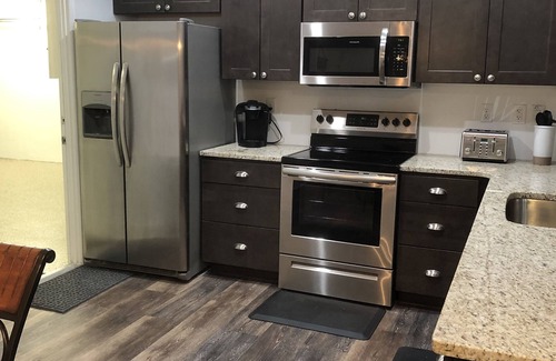 Spring Hill House | Very comfortable house , plenty of room . Lots of TVs for guest . Sleeps 8.