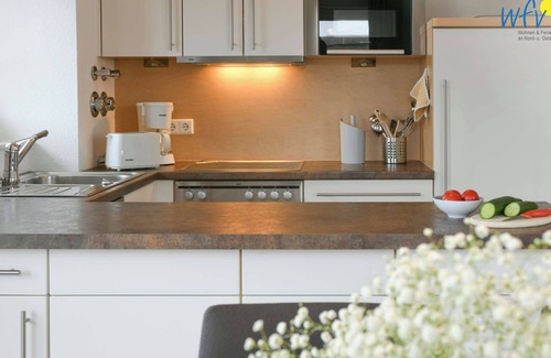 Wangerooge Apartment | Very good location on the Wangeroog beach promenade!