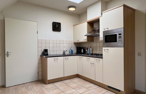 Sint Maartensvlotbrug House | Very spacious and tastefully furnished 3-person apartment near the forest, beach and sea with free WIFI, in a quiet, green and small-scale holiday park.