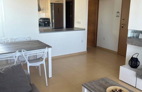 Roldan Apartment | Very well-equipped family apartment in a quiet golf course with swimming pool.