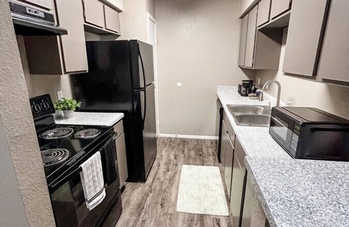 Barker Apartment | Vibrant Texan Escape with Patio & Gated Community