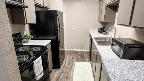 Barker Apartment | Vibrant Texan Escape with Patio & Gated Community