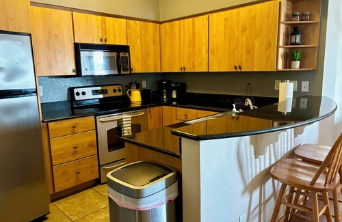 Lago Vista Condo | VILLA 1308 - Top Floor at Island Resort with Panoramic Lakeview & Private Grill