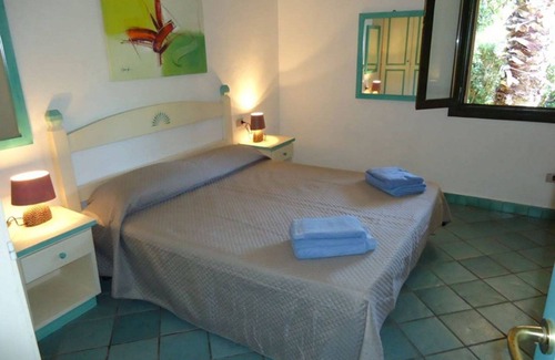 Porto Pozzo Cabin | Villa Allegra 1 - Pool Lawn Barbecue. GER-AL1