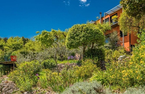 Cabris Villa | Villa among the treetops, overlooking the hilltop village of Cabris and the sea.