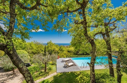 Cabris Villa | Villa among the treetops, overlooking the hilltop village of Cabris and the sea.