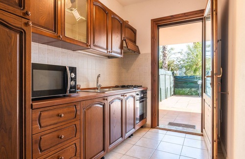 Porto Pino Villa | Villa 'Leo' with Private Terrace, Private Garden and Air Conditioning
