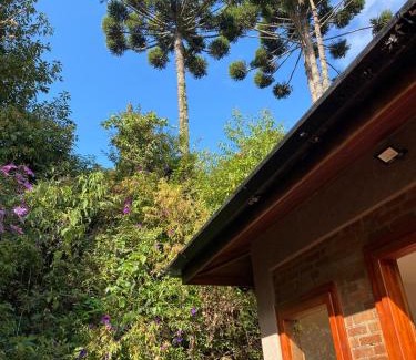 Campos do Jordao Apartment | Villa Mantiqueira - Studio II - Com lareira e área verde