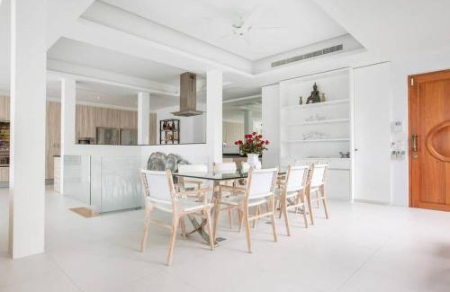 Wichit Villa | Villa Nirvana - Beachfront Tropical Chic 4BR Haven in Cape Panwa, Phuket