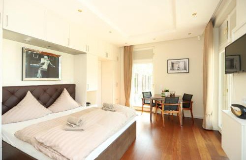 Hohe Dune Apartment | Villa Schmidt - Strandhaus direkt am Meer mit Sauna, Sport und Dünengarten IV