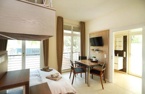 Hohe Dune Apartment | Villa Schmidt - Strandhaus direkt am Meer mit Sauna, Sport und Dünengarten III