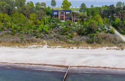 Hohe Dune Apartment | Villa Schmidt - Strandhaus direkt am Meer mit Sauna, Sport und Dünengarten II