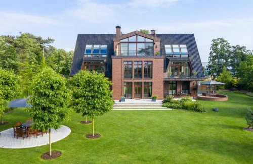 Hohe Dune Apartment | Villa Schmidt - Strandhaus direkt am Meer mit Sauna, Sport und Dünengarten II
