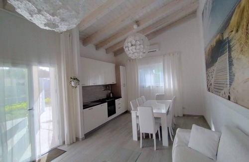 Porto Pino Villa | VILLA Via Marina IKEBANA Porto Pino, prestigious and finished seaside villa