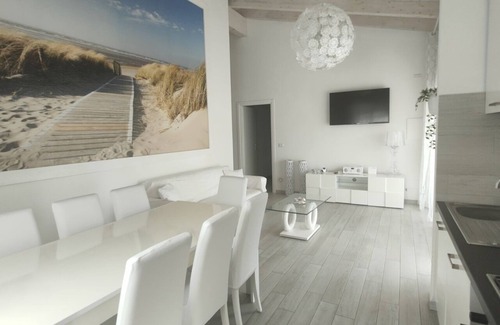 Porto Pino Villa | VILLA Via Marina IKEBANA Porto Pino, prestigious and finished seaside villa