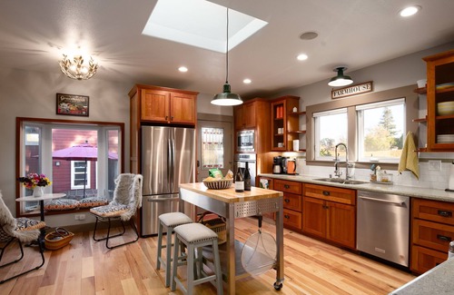 Graton House | Vineyard property with a 1910 Farmhouse and Water Tower