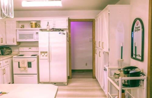 Stanchfield House | Vintage kitsch 70s/80s themed house with indoor pool and backyard creek