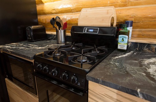 Eagle River Cabin | Vintage Log Cabin Hideaway. Right in Town!