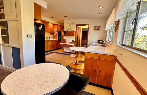 Logan House | Vintage Vibes! Mid century style with modern comfort.