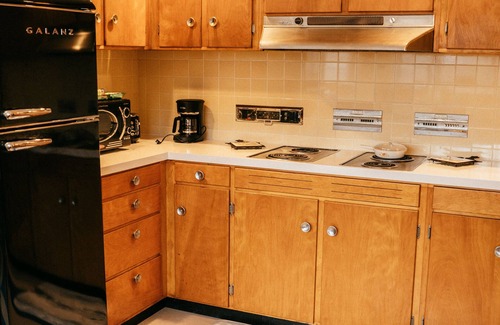 Logan House | Vintage Vibes! Mid century style with modern comfort.