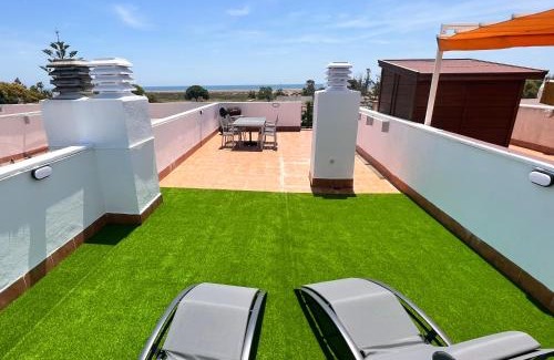 L'Eucaliptus Apartment | Vistas al mar playa Eucaliptus, con solarium privado