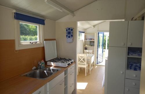 Hengstdijk Ski Chalet | Voormalig strandhuisje in boomgaard in Hengstdijk