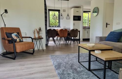 Ewijk House | Vrijstaande woning met grote zonnige tuin va augustus 2025 met jacuzzi