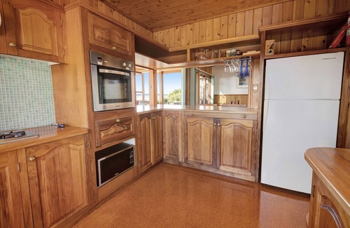 Lake Tyers Beach House | Wake up to panoramic views of the lake from the comfort of your cozy retreat