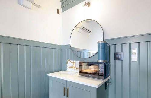 Poulsbo House | Walk everywhere - two luxe rooms at Hotel Scandi with living area & kitchenettes