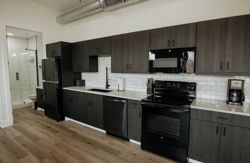 Downtown Wichita Apartment | Walk To Intrust Bank Arena! Modern Loft W/Balcony