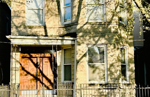 Logan Square House | Walkup Greystone steps to Logan Square restaurants, shopping bars and nightlife.