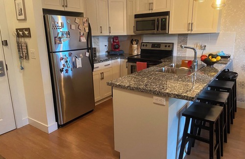 Central Okanagan Condo | Warm and inviting home, private and pet friendly.