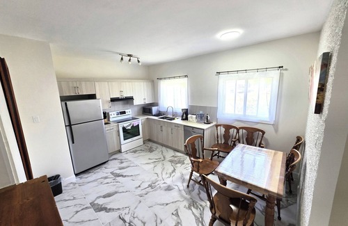 Saint-Hubert House | Warm Welcome Home