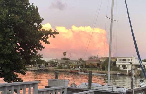Capri Isle House | Watch sunsets from waterfront deck of 3,000 sq-ft. home in Tampa Bay beach town!