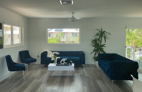 Long Key House | Water front property with bar, tennis, market place, and restaurants close by.
