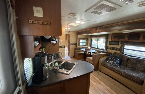 Riverwood RV Rental | Water Front Tracer RV by Glampers Camp