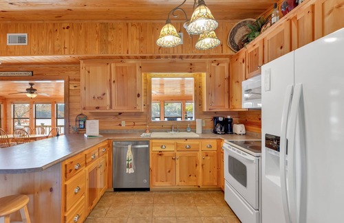 Arley Cabin | "WATER'S EDGE" - Main Channel views, flat lot, boat slip and PWC port!