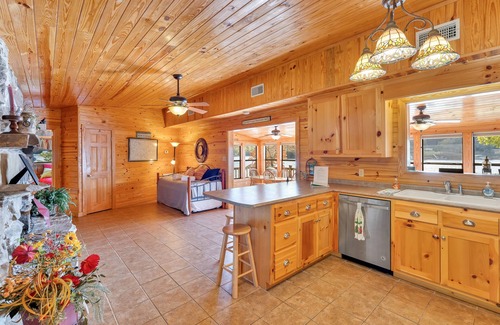 Arley Cabin | "WATER'S EDGE" - Main Channel views, flat lot, boat slip and PWC port!
